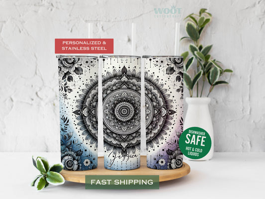 Three tumblers are showing all sides of a mandala tumbler with a personalized name on the button of the tumbler.