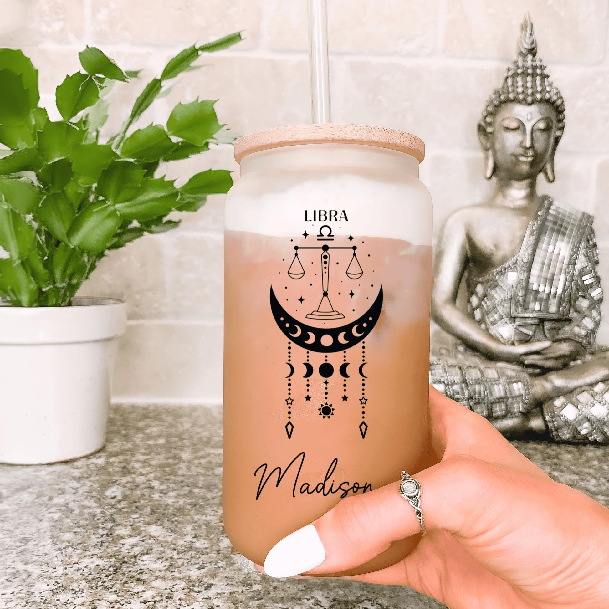 Custom horoscope drinkware featuring a zodiac-inspired design ideal for iced coffee or tea lovers