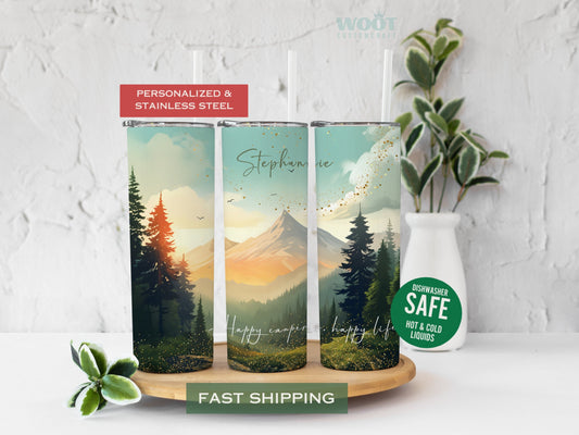 Three tumblers show all sides of a Camping Tumbler. There are mountains and pines, glitter, and a personalized name.