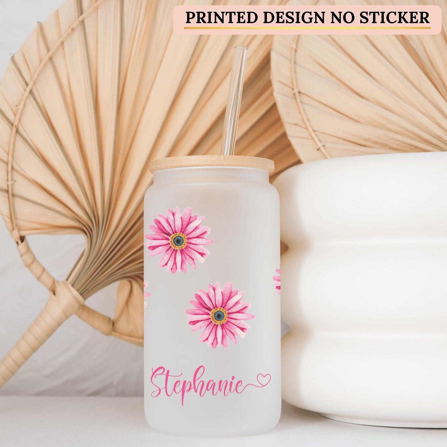 Custom floral glass tumbler with a daisy design perfect for adding a retro aesthetic to your iced coffee routine