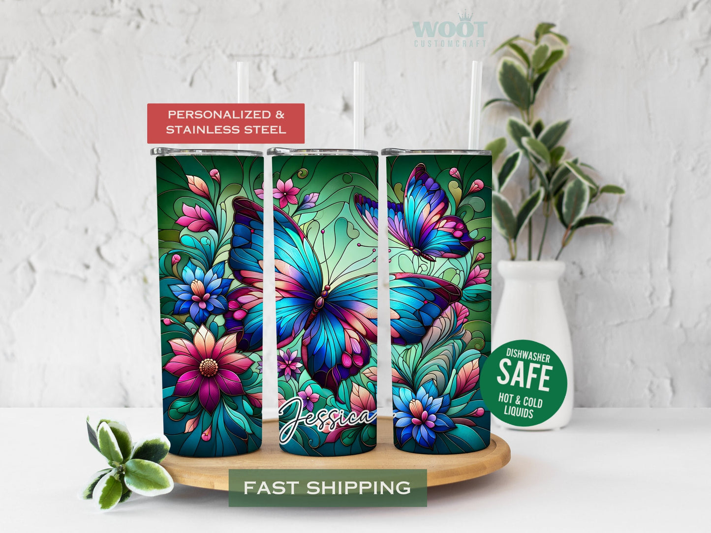 Three tumblers show all the sizes of floral stained glass butterfly tumblers with a personalized name.