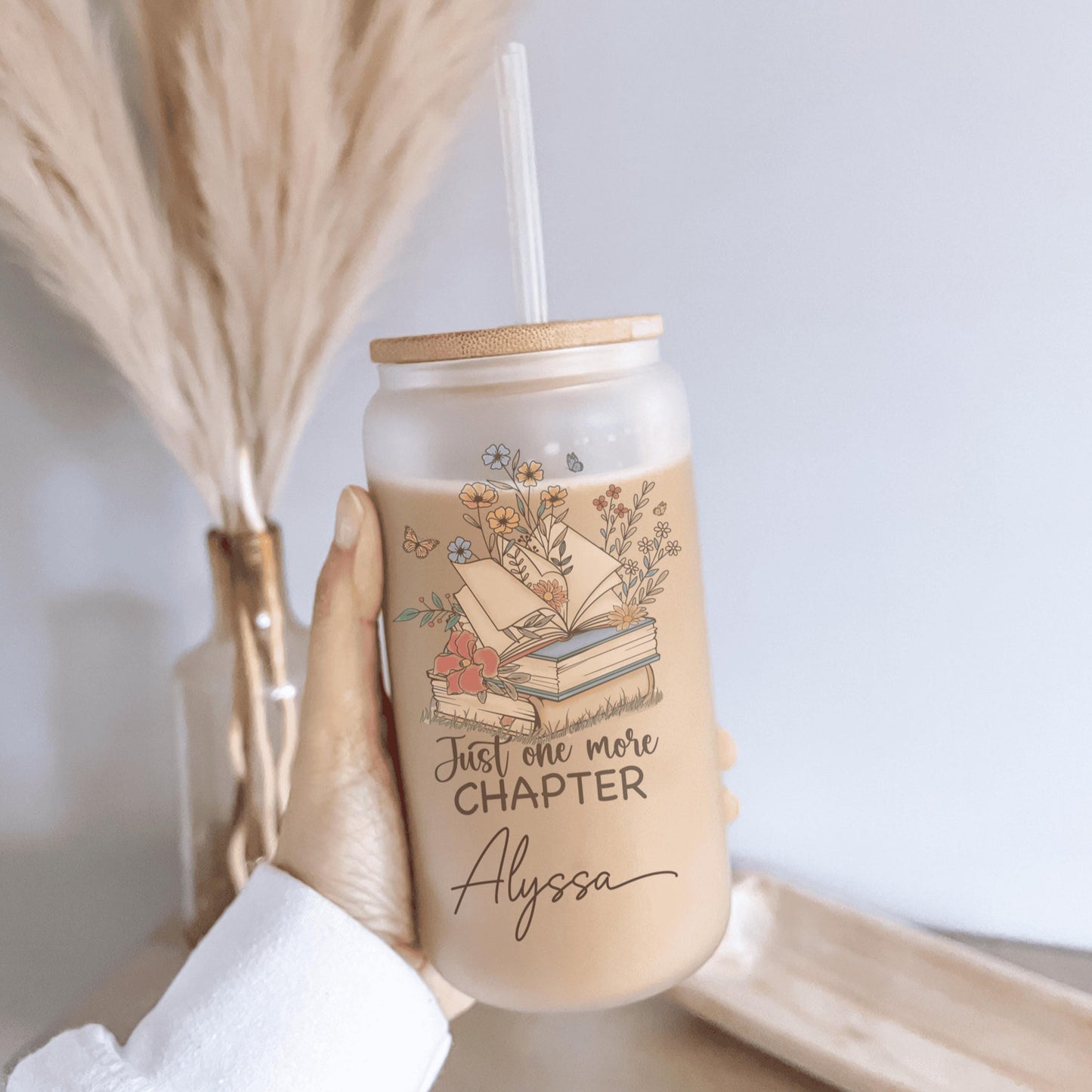 Literary-themed iced coffee cup perfect for gifting to readers who enjoy sipping their drinks while diving into books