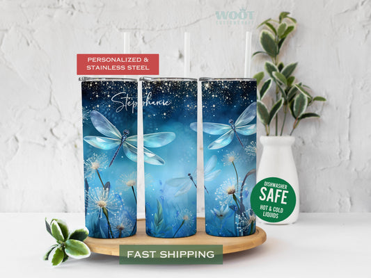 Three tumblers are showing all sides of a Dragonfly Tumbler. There are three dragonflies and flowers on the button, and the personalized name is on the top of the tumbler.